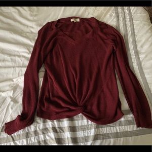 Red sweater with tied front